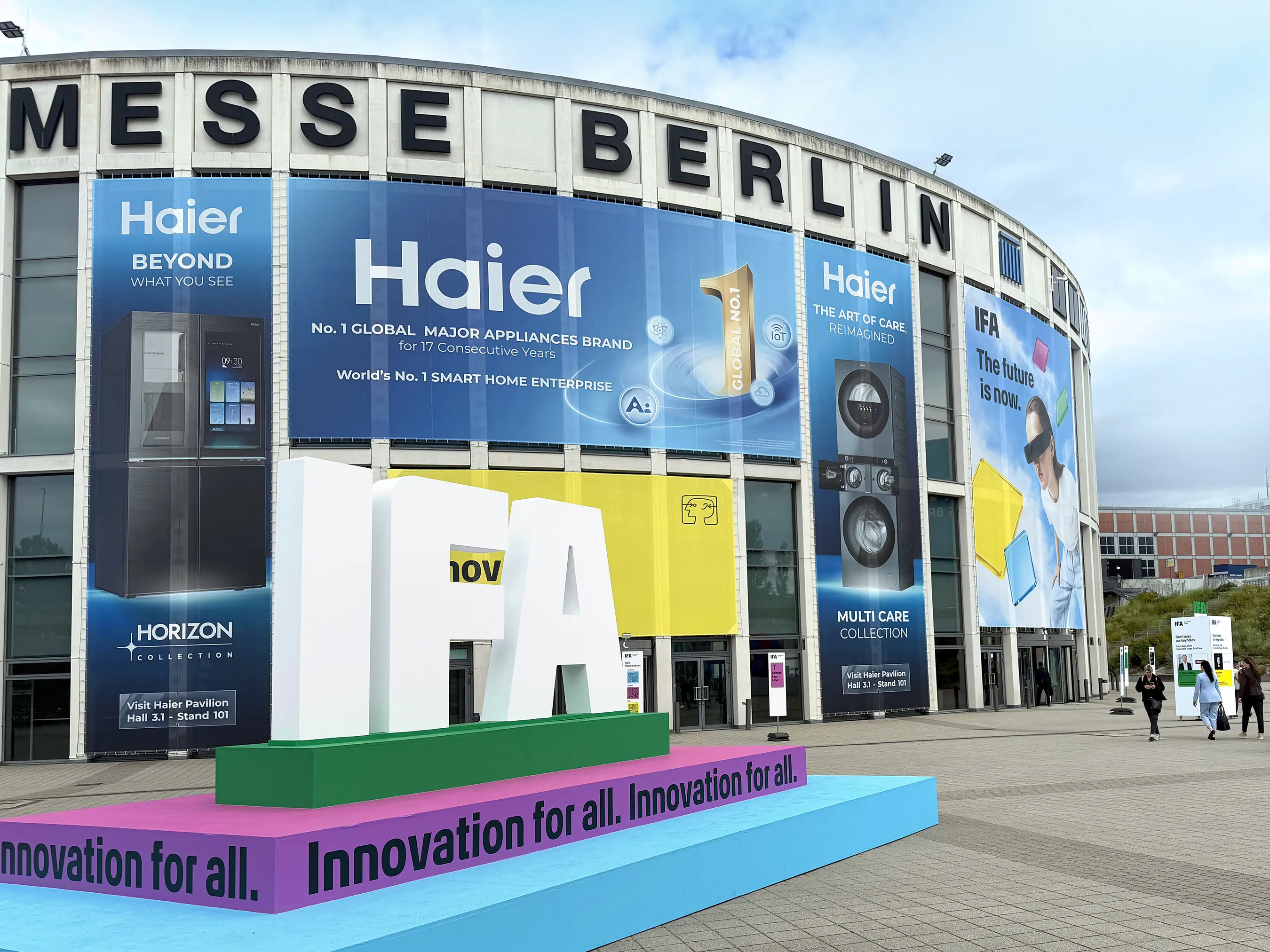 Haier banners and IFA letters on the Messe Berlin exhibition hall exterior.