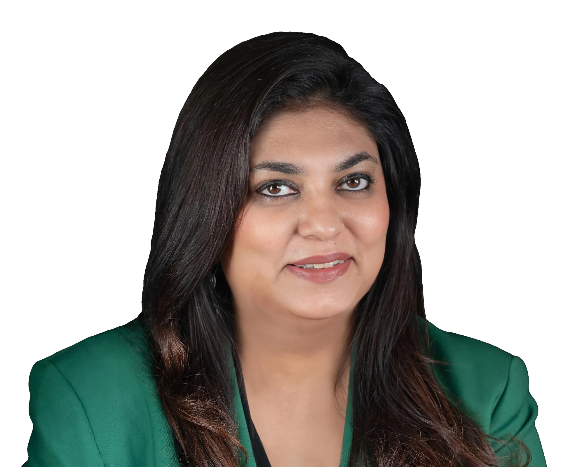 Shweta Rajpal Kohli in a green blazer, seated with hands clasped against a black background.